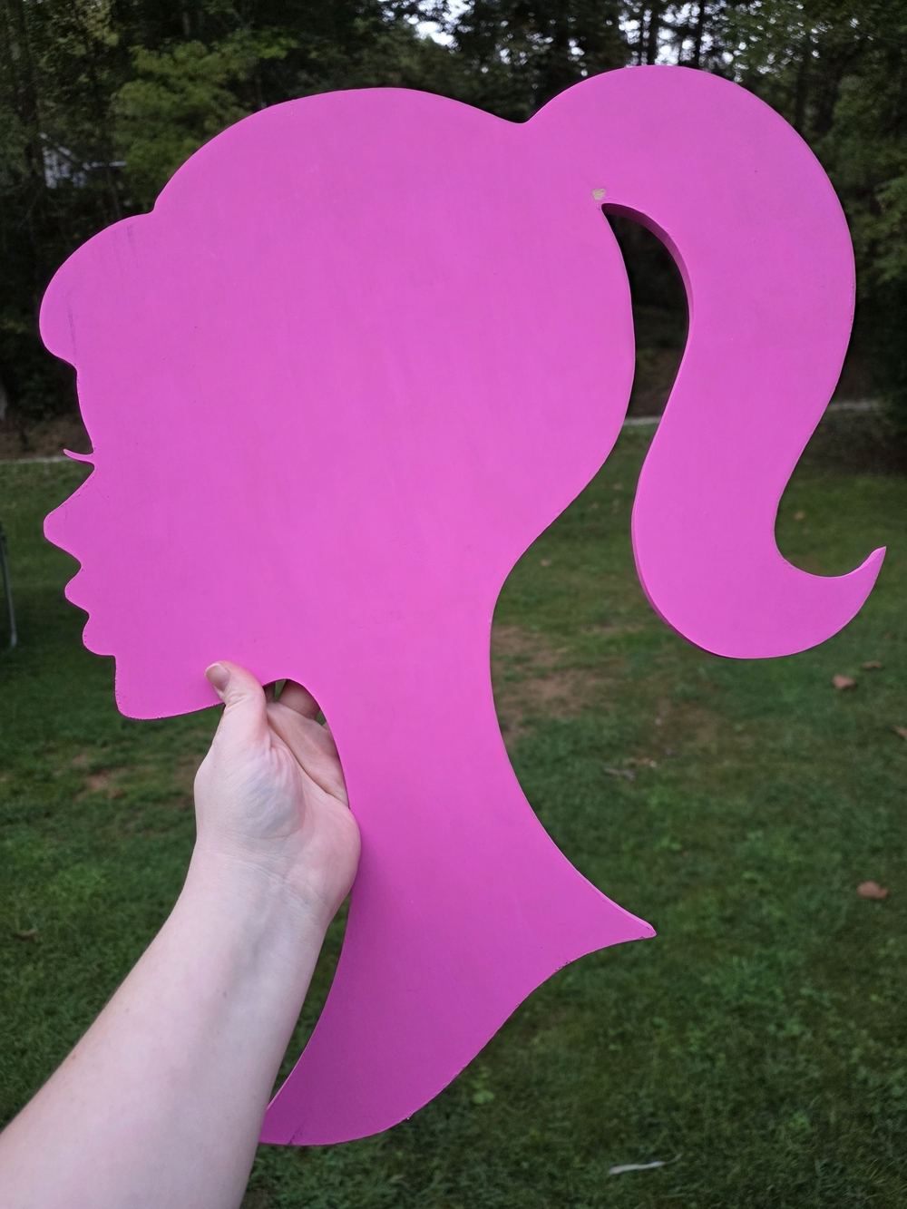 Barbie head wood cutout. Heavy. Solid. See pics/description!